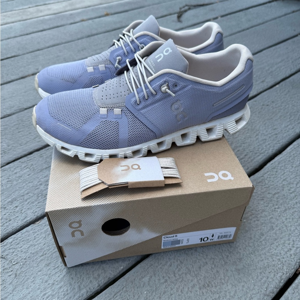 On Running Athletic Shoes in Light Blue and White